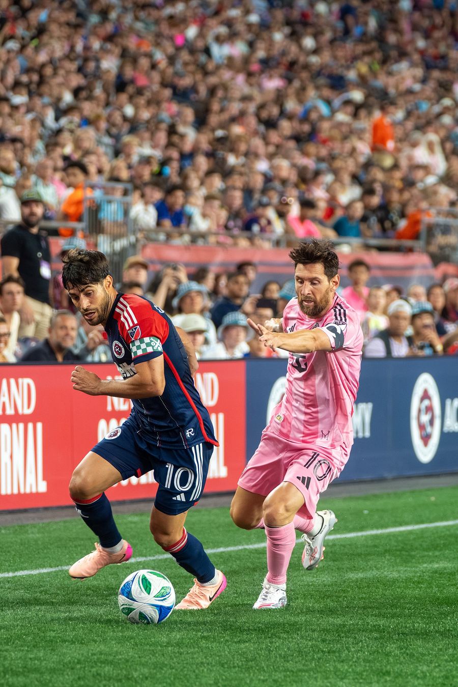 Archive: Lionel Messi (Inter Miami) in contest with Carles Gil (New England Revolution) at Gillette Stadium, 9 Jul 2025 (Bryan Berlin / Wikimedia Commons, CC BY-SA 4.0). Not the 16 September 2026 Campeones Cup final, not Messi’s 100th Inter Miami goal, and not a Chase Stadium day-of still.