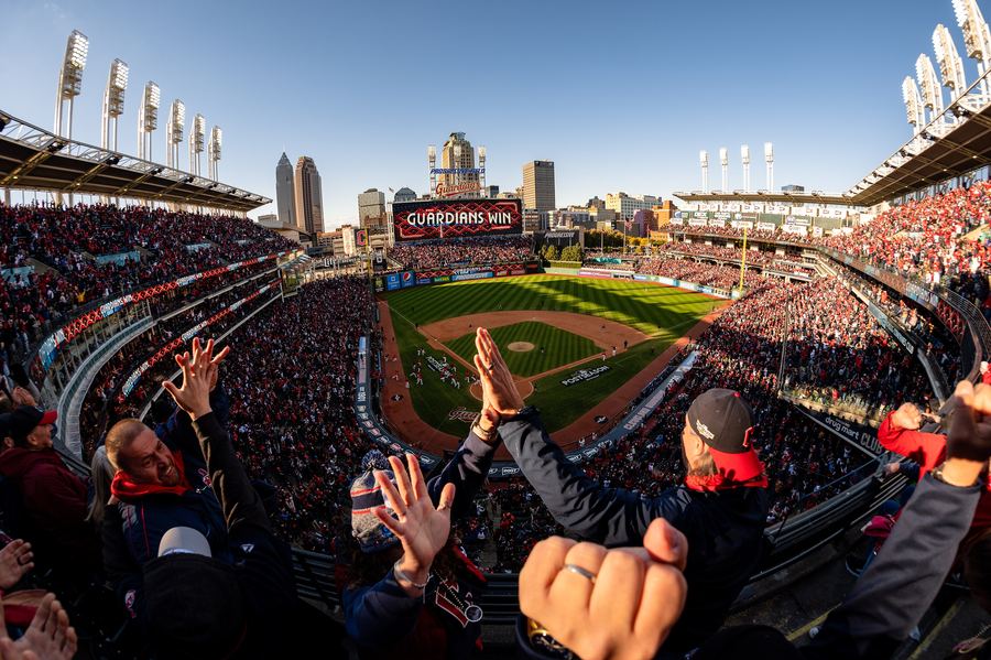 Archive: Fans celebrate GUARDIANS WIN scoreboard, Progressive Field, AL Wild Card G2 vs Rays, 8 Oct 2022 (Erik Drost / Flickr via Commons, CC BY 2.0). Not the 18 September 2026 Guardians sole AL Central lead, not a Tigers–White Sox 11–8 rally still, and not a day-of Progressive sole-lead still.