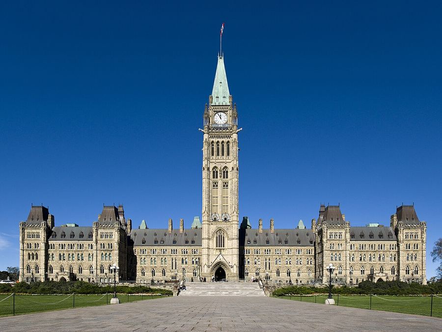 Archive: Centre Block and the Peace Tower on Parliament Hill, Ottawa — Saffron Blaze (CC BY-SA 3.0). Not the 25 September 2026 Canada–Germany security-of-information agreement signing, not day-of Canadian or German ministers photography, and not a classified-document still.