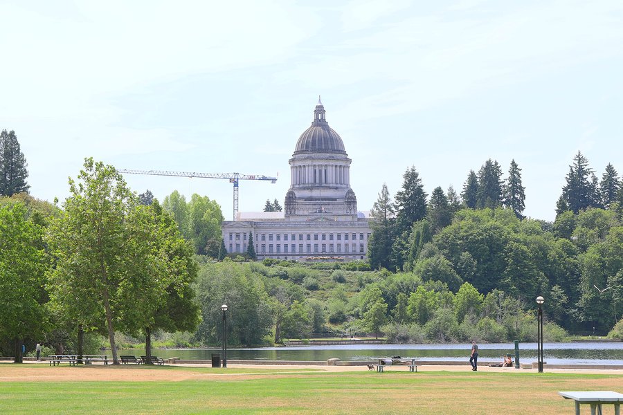 Archive photo: the Washington State Capitol across Capitol Lake in Olympia, June 2025.